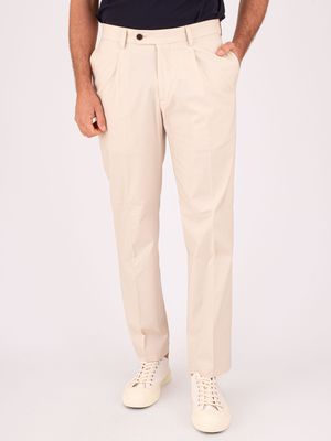 1. Pantalone uomo Devorè in misto cotone con linee sartoriali e pinces Mandorla