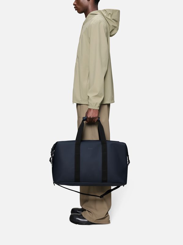 3. Rains Hilo Weekend Bag with Large Compartment and Padded Handles Blue RAINS 14200